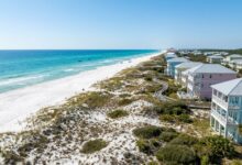 Aerial view of white sand beaches and emerald waters along Florida's 30A coastal corridor