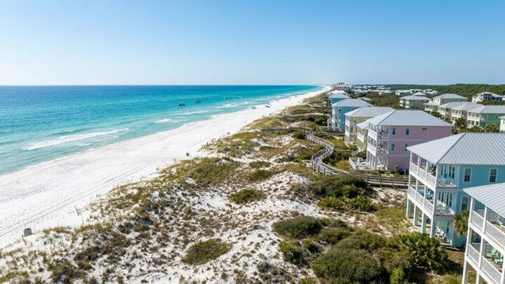 Aerial view of white sand beaches and emerald waters along Florida's 30A coastal corridor