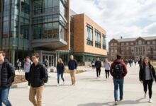 Penn State University campus building with students walking near academic facilities